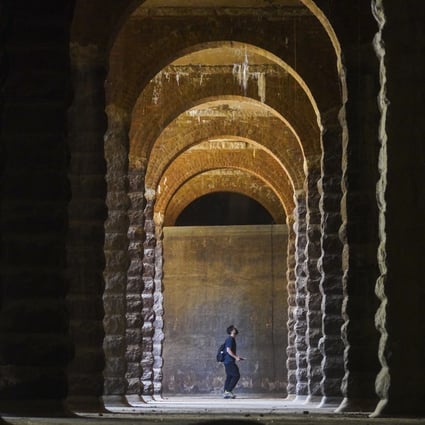 A visitor looks at the recently unearthed service reservoir on Bishop Hill, believed to have been built in 1904. Photo: Winson Wong