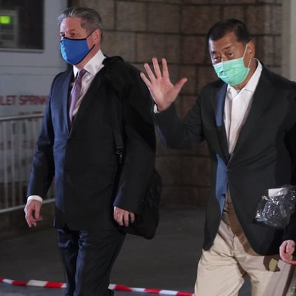 Apple Daily founder Jimmy Lai Chee-ying (middle) was released on bail on Christmas Eve, while prosecutors prepare to file an appeal. Photo: Robert Ng
