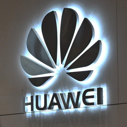 In this file photo taken on May 29, 2019 a company logo is displayed at a reception area at the Huawei headquarters in Shenzhen, Guangdong province. Photo: AFP
