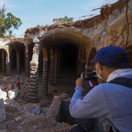 Visitors at the century-old service reservoir featuring Roman-style arches and columns, in Bishop Hill, Shek Kip Mei, on December 28. A public outcry has put a halt to demolition works. Photo: Winson Wong