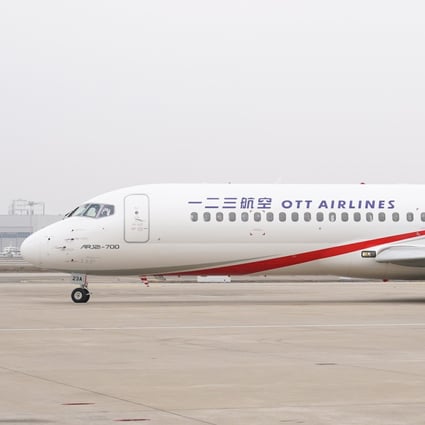 An ARJ21 jetliner owned by One Two Three Airlines (OTT Airlines) before its first flight between Shanghai and Beijing. Photo: Xinhua