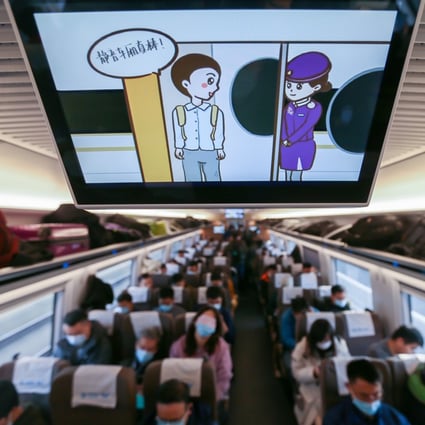 A promotional video about the quiet carriage is played on a Beijing-Shanghai high-speed train, which links the two cities in China. Photo: Wang Xiang