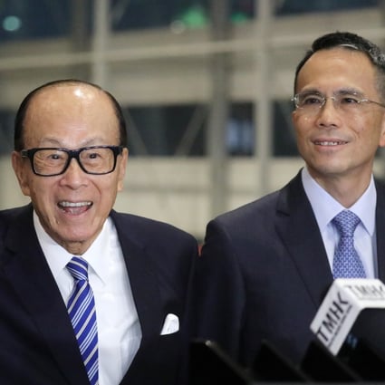 Li Ka-shing with his son, Victor Li Tzar-kuoi, at a company dinner in Wan Chai on January 10. Li is one of the four 90-somethings among Hong Kong’s 10 richest people. Photo: Dickson Lee