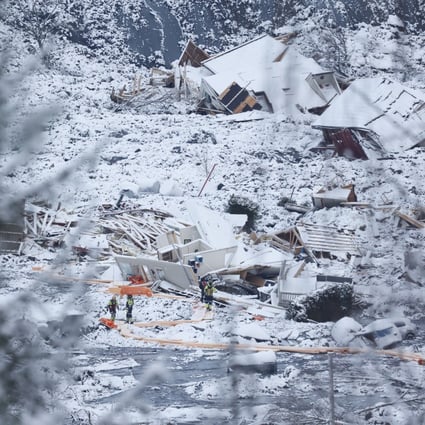 Rescue crews work in the area at Ask in Gjerdrum, Norway, on Saturday. Photo: NTB via AP