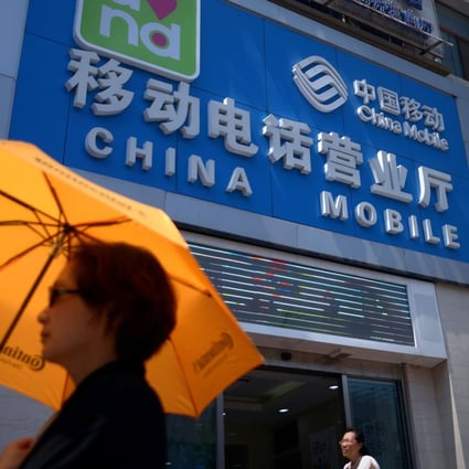 The New York Stock Exchange will delist China Mobile and peers China Unicom and China Telecom from January 7 to comply with Trump’s executive order. Photo: AFP