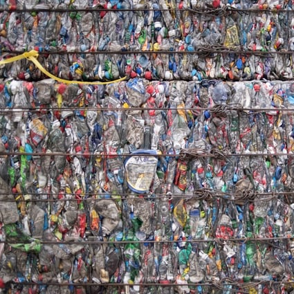 A block of compressed plastic bottles at a plastic waste centre on the outskirts of Beijing on May 16, 2018. Photo: AFP