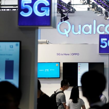 Signs of Qualcomm and 5G are pictured at Mobile World Congress (MWC) in Shanghai, China June 28, 2019. Photo: Reuters
