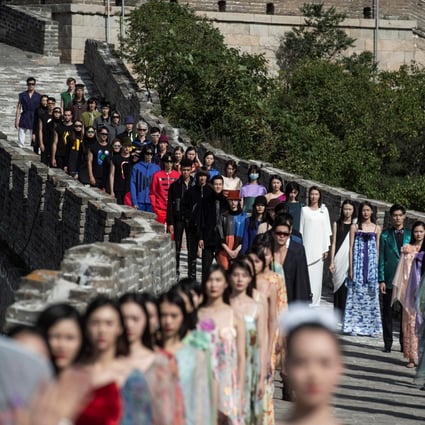 Models walk along the Great Wall of China during the Pierre Cardin China Legend 40th Anniversary Fashion Show on the outskirts of Beijing in 2018. French fashion designer Cardin was revered in China. Photo: AFP