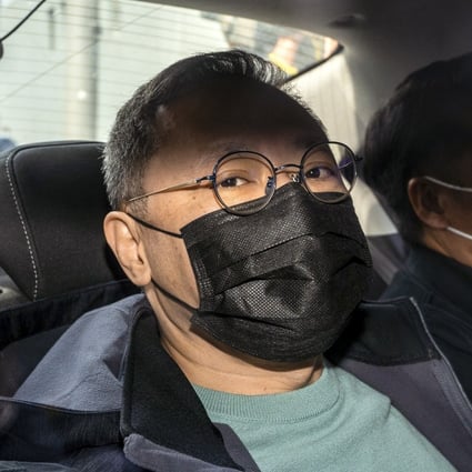 Opposition activist Benny Tai is taken to Ma On Shan Police Station after his arrest. Photo: Bloomberg