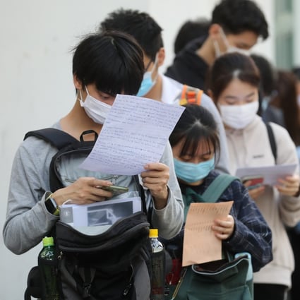 Hong Kong secondary students wait to sit a paper in the DSE exam at a school in Shek Kip Mei, Hong Kong, on April 28 last year. The pandemic has brought much disruption to the school system and stress to many students. Photo: Winson Wong
