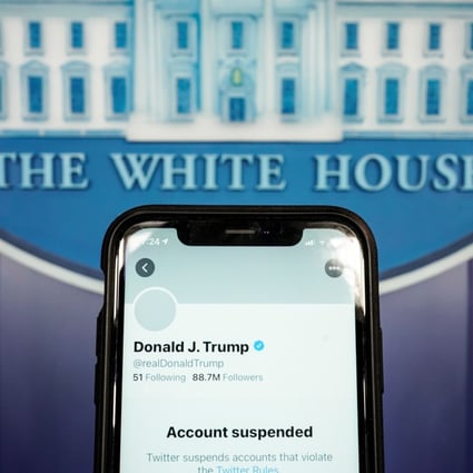 The suspended Twitter account of US President Donald Trump appears on a smartphone screen at the White House briefing room in Washington. Photo: Reuters