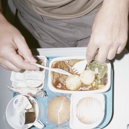 Airlines are tackling the problem of food waste on flights by asking travellers to opt out of meals before they fly and by using artificial intelligence to analyse and predict in-flight food consumption. Photo: Getty Images