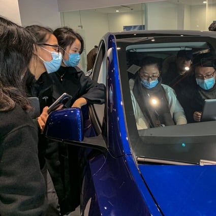 Customers thronged a Tesla showroom on Shibo Avenue in Shanghai's Pudong district to check out the locally assembled Model Y on January 3. Photo: Daniel Ren