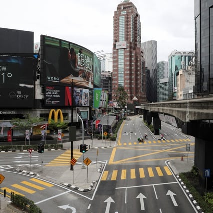 Deserted roads in Kuala Lumpur on the first day of the country’s latest lockdown. Photo: Reuters