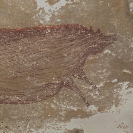The painting was made at least 45,500 years ago in Indonesia. Photo: Griffith University / AFP