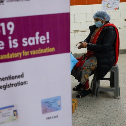 A volunteer registers for a vaccine during a nationwide trial of Covid-19 jab delivery systems at a temporary vaccination centre in New Delhi on January 8. Photo: Reuters