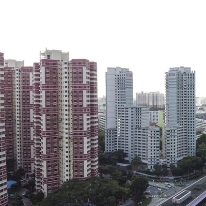 Public housing units by the Housing and Development Board, left, and private residential buildings under construction in Singapore. Photo: Roy Issa