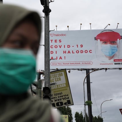 An advertisement for a coronavirus vaccine in Bandung, West Java, Indonesia. Photo: Bloomberg