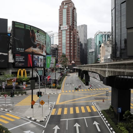 Deserted roads in Kuala Lumpur after a lockdown and state of emergency were imposed to curb the spread of Covid-19. Photo: Reuters