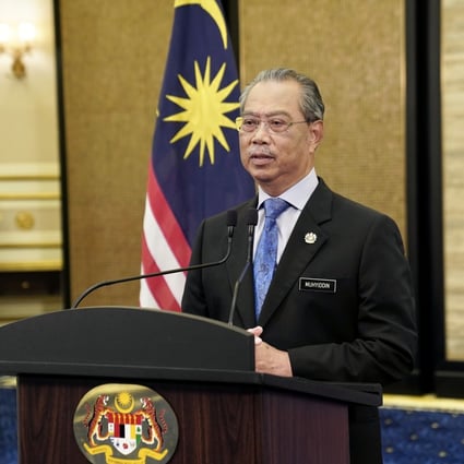 Prime Minister Muhyiddin Yassin speaks during a special address after Malaysia’s king announced the imposition of a state of emergency across the country to limit the spread of Covid-19. Photo: DPA