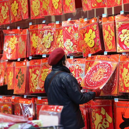 Chinese citizens are being encouraged not to travel for the Lunar New Year holiday because of concerns the usual mass migration to the countryside and back will spread Covid-19. Photo: Getty Images