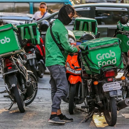 A driver prepares to deliver food in Makati, the Philippines, on May 1, 2020. Grab expanding its services by delivering users’ orders from wet markets is one example of digital innovation in Southeast Asia during the pandemic. Photo: Xinhua