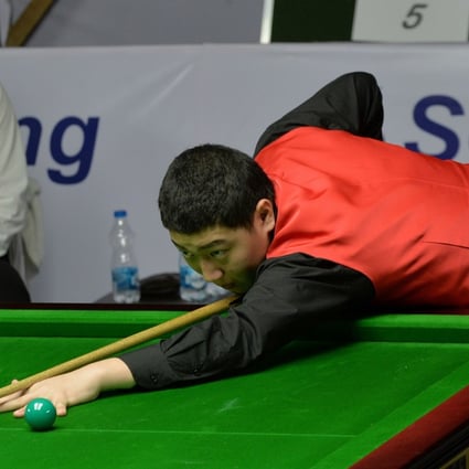 China’s Yan Bingtao playing in the 2014 IBSF World Amateur Championship final against Pakistan’s Mohammad Sajjad. Photo: AFP