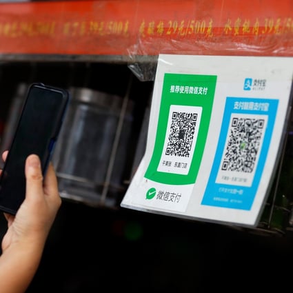 WeChat Pay and Alipay QR codes seen at a shop in Beijing on August 6, 2020. The two apps account for more than 90 per cent of China’s mobile payments market, but new rules from China’s central bank specify different markets that could impact whether the companies qualify as monopolies. Photo: Reuters