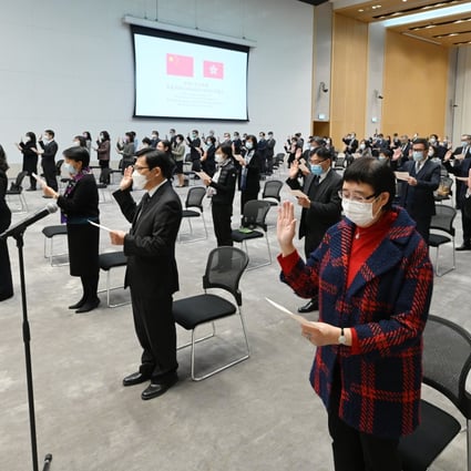 Senior civil servants take their oath at a recent ceremony. Source: Handout