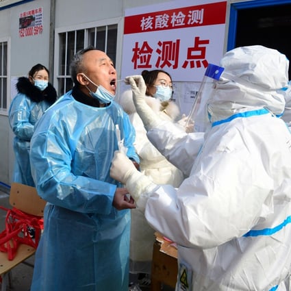 Residents receive coronavirus tests at a residential compound in Shijiazhuang, Hebei province, as part of a mass testing programme after the province declared an “emergency state” this month. Photo: AFP