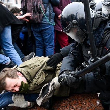 Protesters clash with riot police during a rally in support of jailed opposition leader Alexei Navalny in downtown Moscow, Russia on Saturday. Photo: AFP