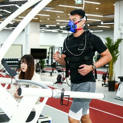 A man tests wearable devices on a sensor-filled treadmill at Huawei Technologies Co’s health research laboratory in Xian, capital of northwest China’s Shaanxi province. Photo: Handout