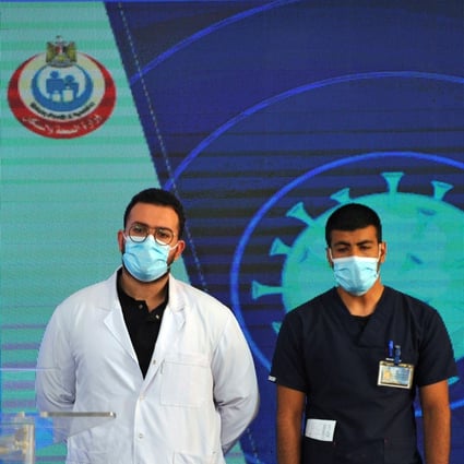 Dr Abdel Menoim Selim and nurse Ahmed Hamdan Zayed, the first two Egyptians to receive China’s Sinopharm Covid-19 vaccine, at Abou Khalifa hospital in Ismailia, Egypt on Sunday. Photo: Reuters
