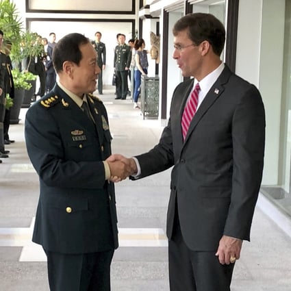 Chinese Defence Minister Wei Fenghe greets his then US counterpart Mark Esper in 2019, but Esper’s later sacking preceded a rocky spell for military exchanges. Photo: AP