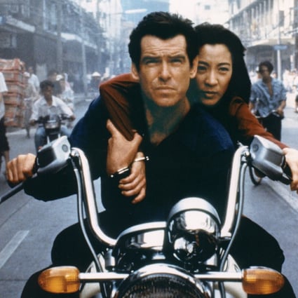 Pierce Brosnan and Michelle Yeoh in a still from Tomorrow Never Dies, one of a number of James Bond films that took the spy to Asia. Photo: AP