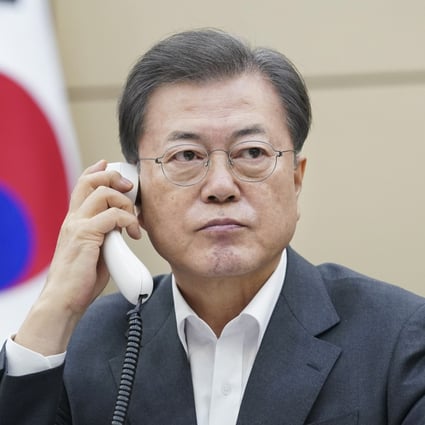 South Korean President Moon Jae-in speaks by telephone with Chinese President Xi Jinping in February last year. Photo: DPA