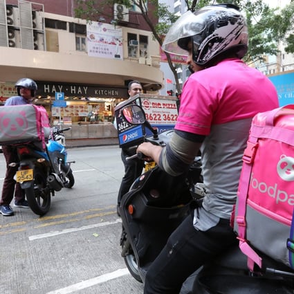 Food Panda delivery men in Wan Chai. Photo: Felix Wong
