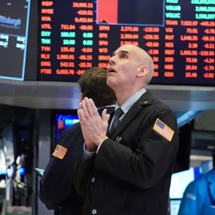 Floor traders at the New York Stock Exchange on March 18, 2020. Photo: AFP