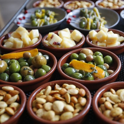 Sharing snacks is an important part of many cultures, say anthropologists. Tapas, dim sum and meze have caught on around the world. Photo: Getty Images