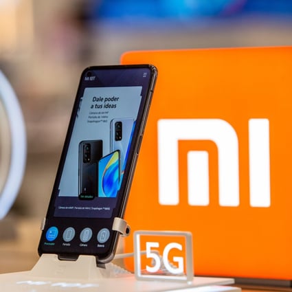 A Mi 5G smartphone by Xiaomi Corp on display inside the AliExpress plaza retail store, operated by Alibaba Group Holding, in Barcelona on January 13, 2020. Photo: Bloomberg
