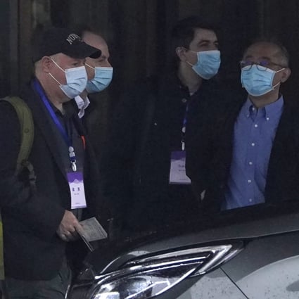 Members of the WHO team prepare to leave their hotel for a fourth day of field visits in Wuhan on Monday. Photo: AP