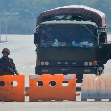 Soldiers block the road heading to Myanmar’s parliament in Naypyidaw on Monday. Photo: AFP