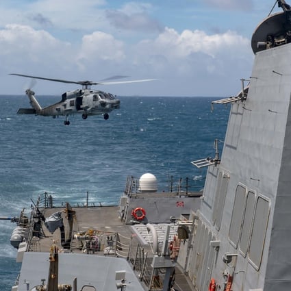 A helicopter takes off from guided-missile destroyer the USS Mustin during an operation in the Taiwan Strait in August. Most US opinion leaders surveyed favoured military defence of Taiwan in an invasion scenario. Photo: US Navy