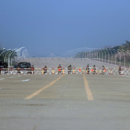 Soldiers block the road heading to Myanmar’s parliament in Naypyidaw on Monday. Photo: EPA-EFE