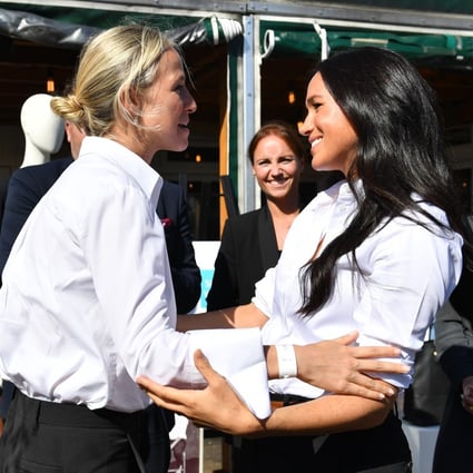 Meghan Markle (right), the Duchess of Sussex, embraces designer Misha Nonoo as the pair launch the Smart Works capsule collection on September 12, 2019 in London, England. Photo: Getty Images
