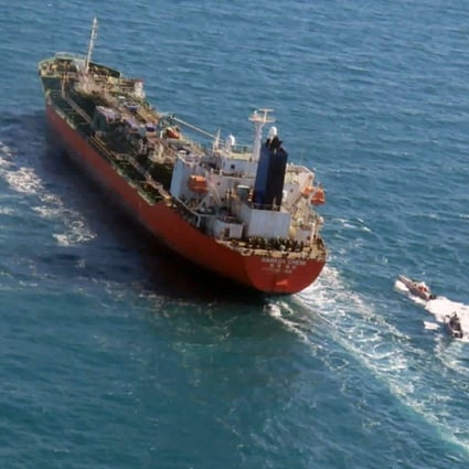 The seized South Korean-flagged tanker Hankuk Chemi is escorted by Iranian Revolutionary Guard boats in the Persian Gulf last month. Photo: Tasnim News Agency via AP