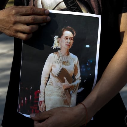 A supporter holds a photo of Myanmar leader Aung San Suu Kyi during a protest against the military coup on Tuesday. Photo: EPA-EFE