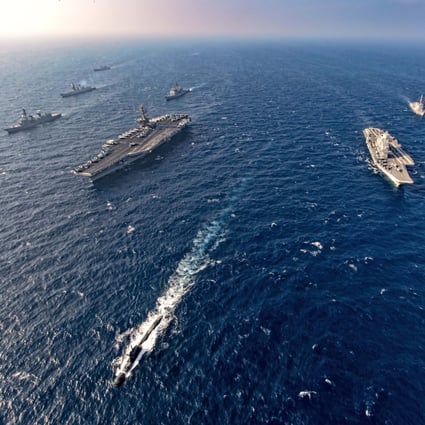 Aircraft carriers and warships from India, US, Japan and Australia – the four countries comprising the Quad – participate in the Malabar naval exercise in November 2020. Photo: AP