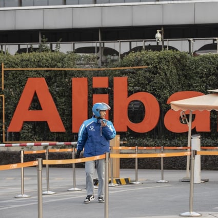 A food delivery worker exits the campus of the Alibaba headquarters in Hangzhou, China. Photo: Bloomberg