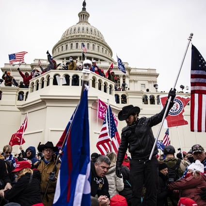 Supporters of former US president Donald Trump storm the US Capitol following a rally on January 6 in Washington. Photo: AFP